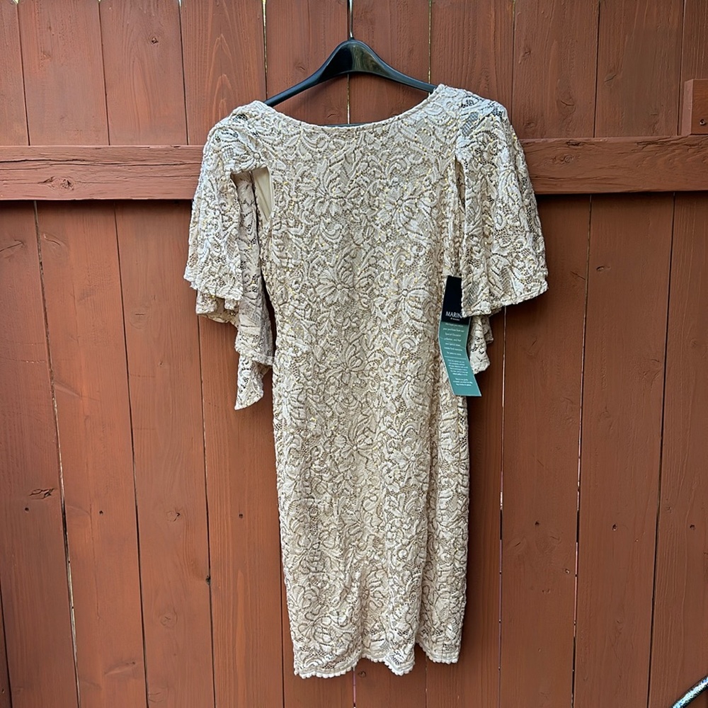 Sequined Dress from Marina with wing shoulders!